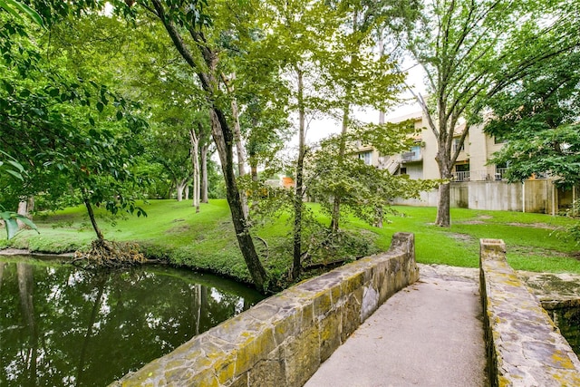 surrounding community featuring a lawn