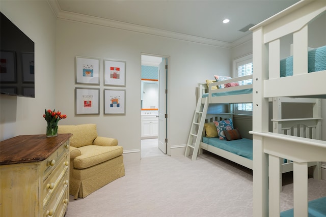 carpeted bedroom featuring crown molding