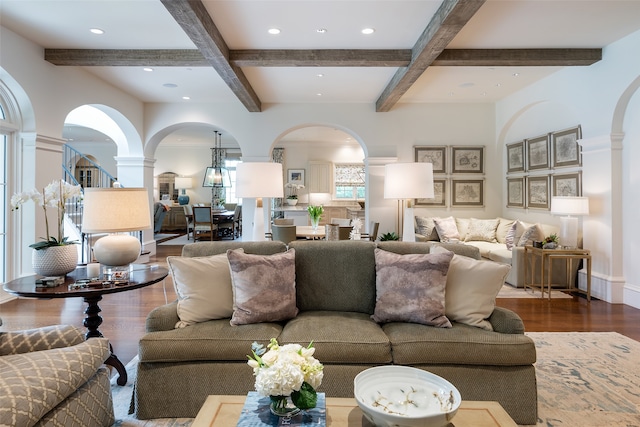 living room with coffered ceiling, beam ceiling, and hardwood / wood-style flooring