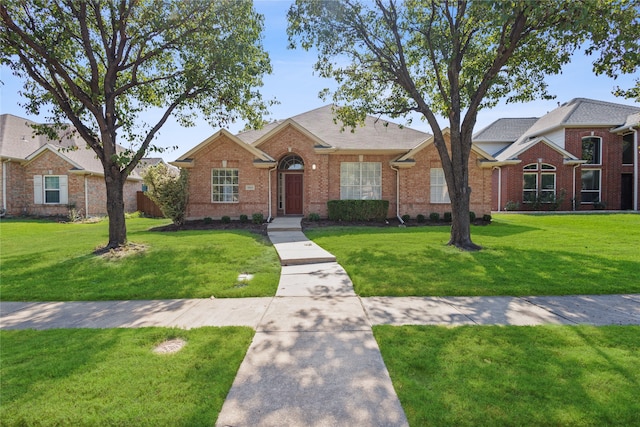 ranch-style home with a front yard