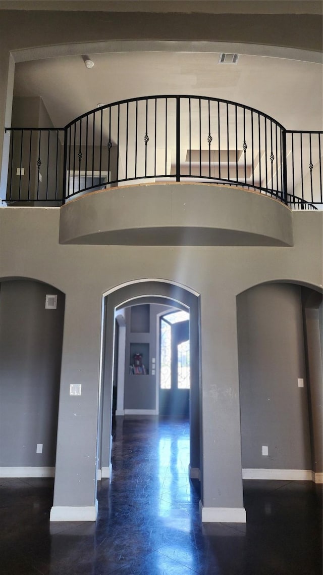 interior space with a towering ceiling