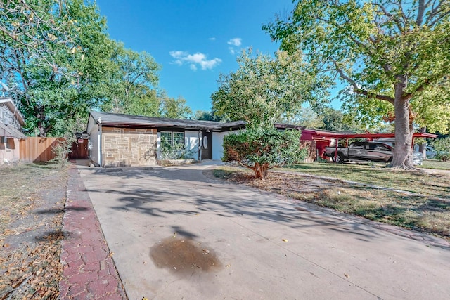 ranch-style house featuring a garage