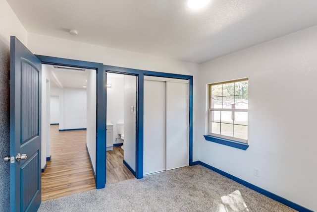 unfurnished bedroom featuring light hardwood / wood-style floors