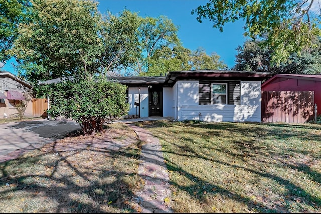 view of front of property with a front lawn