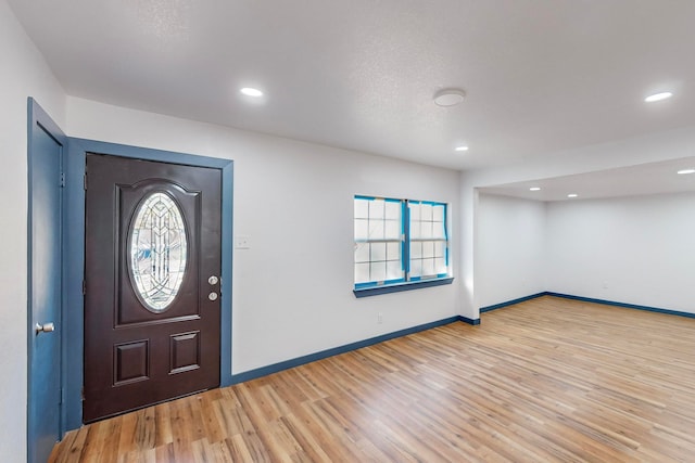 entrance foyer featuring light hardwood / wood-style floors