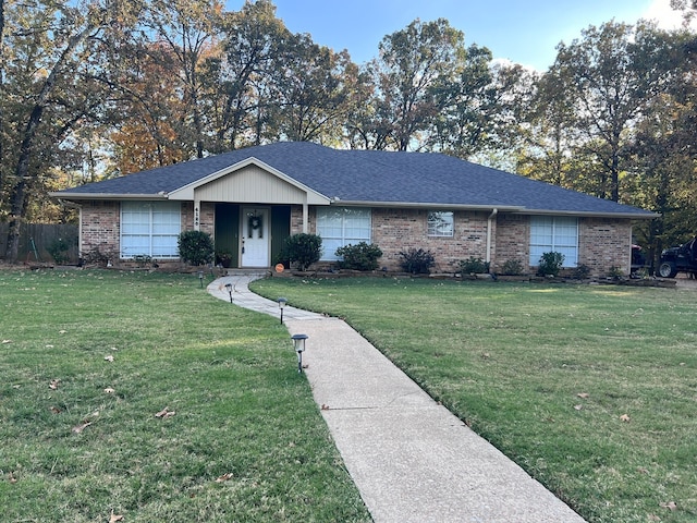 ranch-style house with a front yard