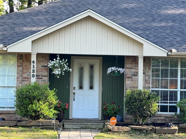 doorway to property with covered porch