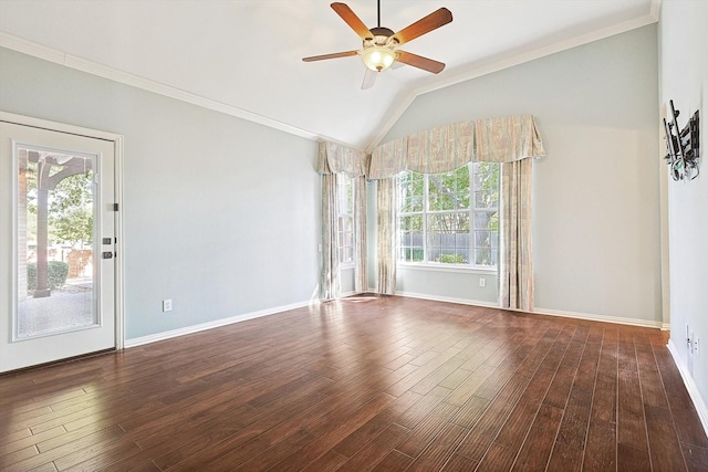 spare room featuring plenty of natural light, lofted ceiling, and dark hardwood / wood-style flooring