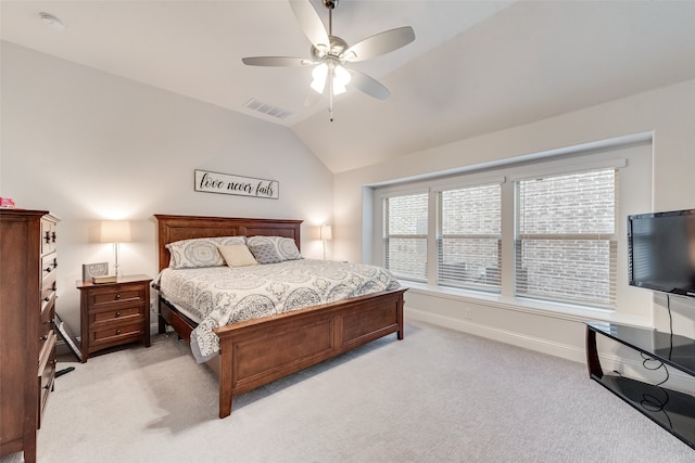 carpeted bedroom with lofted ceiling and ceiling fan