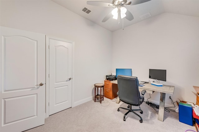 carpeted home office with lofted ceiling and ceiling fan