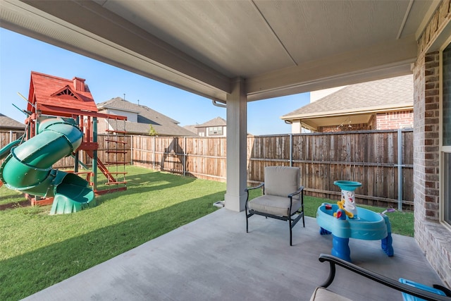 view of patio with a playground