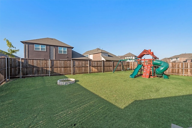 view of yard with a playground