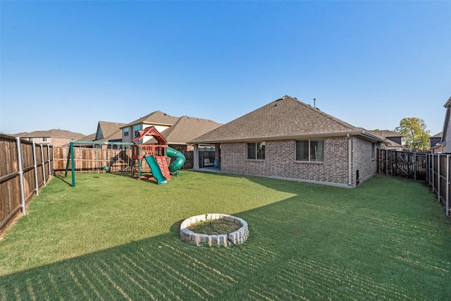 view of yard featuring a playground