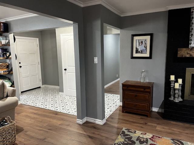 hall with crown molding and wood-type flooring