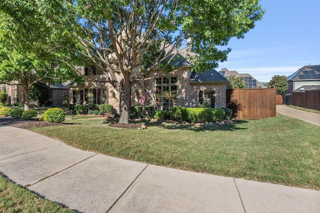 view of front facade with a front lawn