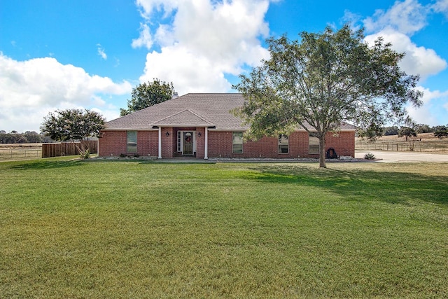 single story home with a front yard