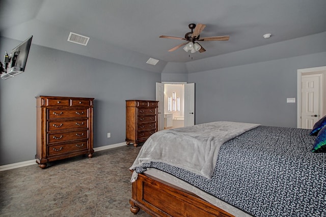 carpeted bedroom featuring ensuite bathroom, vaulted ceiling, and ceiling fan