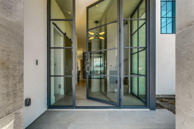 property entrance featuring stucco siding