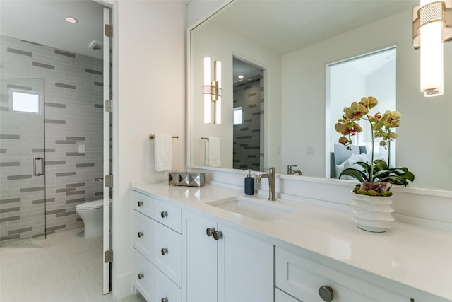 315 Regal Ln, Irving, TX 75039 - full bathroom with vanity, a shower stall, toilet, and recessed lighting