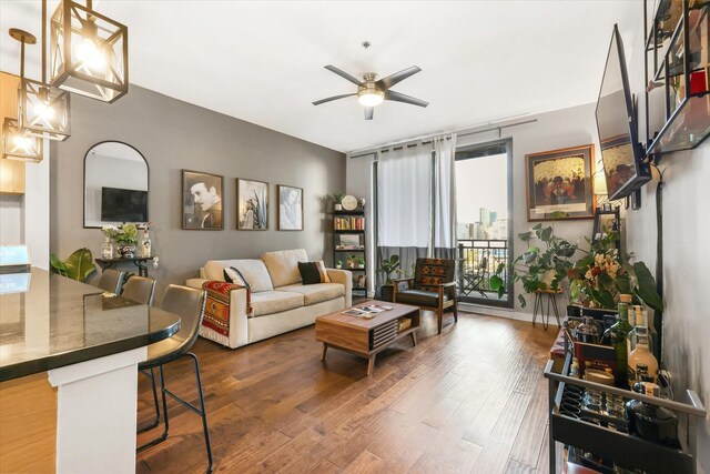 1200 Main St Unit 503, Dallas, TX 75202 - living area with ceiling fan and wood finished floors