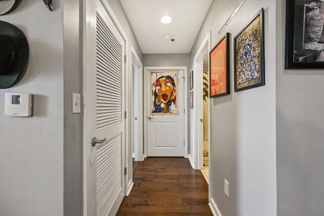 1200 Main St Unit 503, Dallas, TX 75202 - hall with recessed lighting, dark wood finished floors, and baseboards