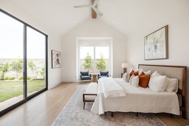 bedroom featuring high vaulted ceiling, light wood-style floors, baseboards, beam ceiling, and access to exterior