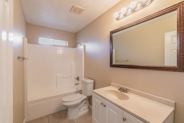 full bathroom featuring tile patterned floors, toilet, shower / bathing tub combination, vanity, and a textured ceiling