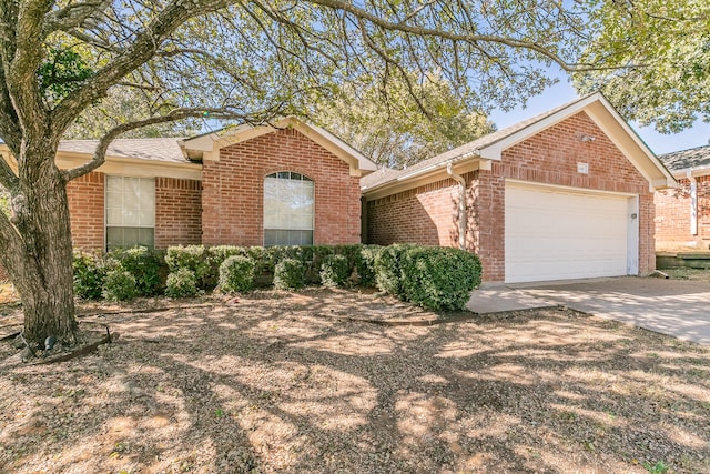 ranch-style home with a garage