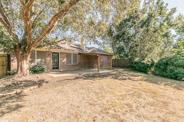 rear view of property with a patio