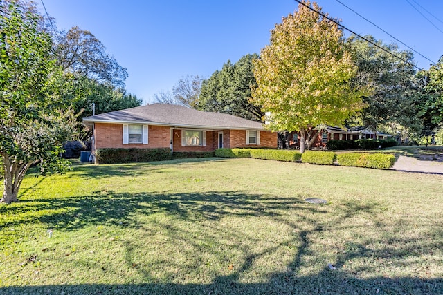 single story home with a front yard