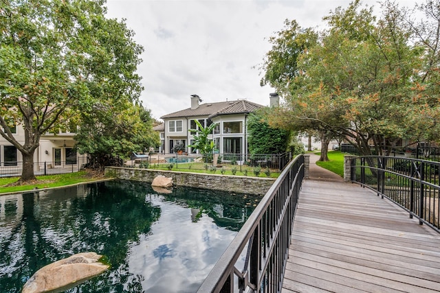 exterior space with a water view