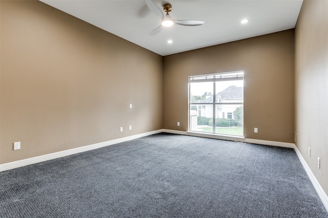 carpeted empty room with ceiling fan