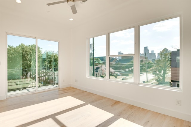 unfurnished room with recessed lighting, baseboards, ceiling fan, and wood finished floors