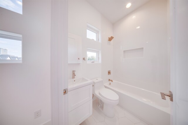 full bathroom featuring toilet, vanity, and shower / bathtub combination