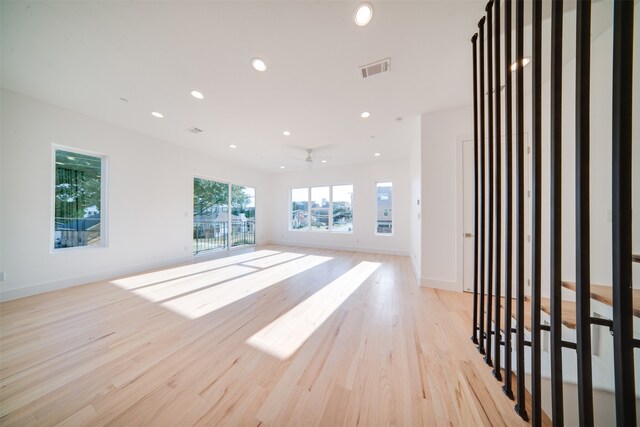 unfurnished living room featuring light hardwood / wood-style floors