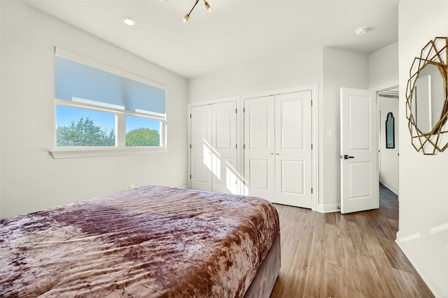 bedroom featuring light hardwood / wood-style floors