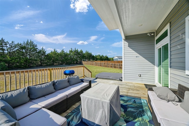 view of patio with a wooden deck, an outdoor living space, and a grill