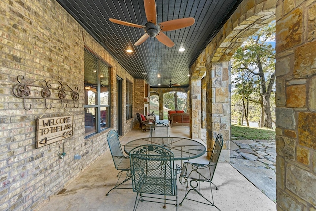 view of patio / terrace featuring outdoor dining space and ceiling fan