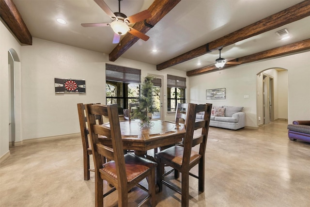 dining room with a ceiling fan, recessed lighting, baseboards, arched walkways, and beamed ceiling