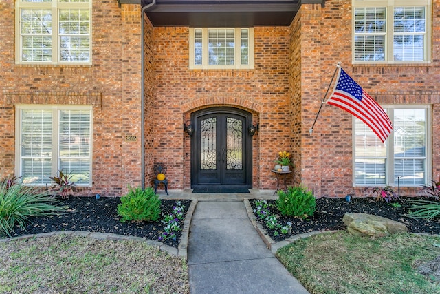 doorway to property featuring french doors