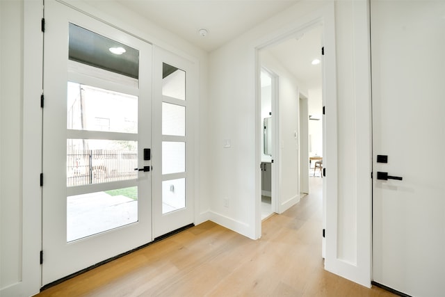 doorway featuring light wood-type flooring