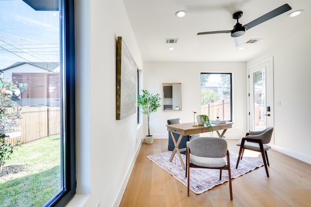 dining area featuring ceiling fan and light hardwood / wood-style flooring