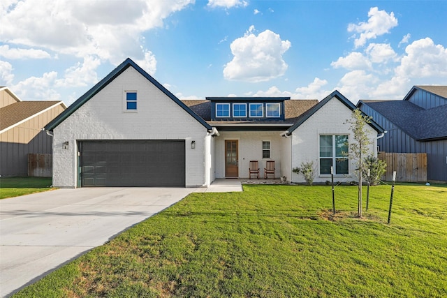 modern farmhouse style home featuring brick siding, fence, a shingled roof, a front yard, and concrete driveway