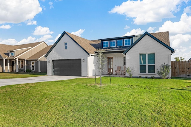 view of front of home featuring a front yard, brick siding, driveway, roof with shingles, and fence