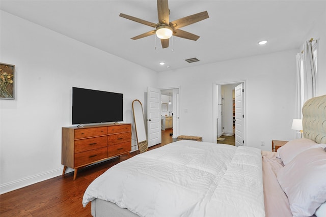 bedroom featuring ceiling fan and dark hardwood / wood-style flooring