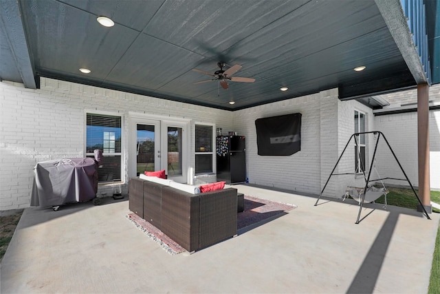 view of patio / terrace with outdoor lounge area, ceiling fan, and a grill