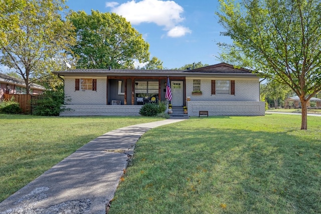 ranch-style house with a front yard