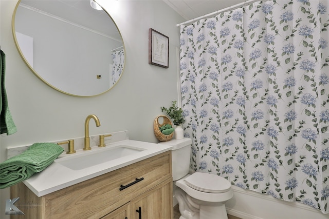 full bathroom featuring vanity, shower / bath combo, and toilet