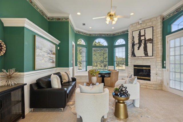 living room with light carpet, a brick fireplace, a wealth of natural light, and crown molding