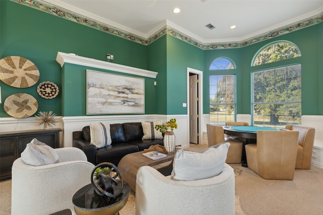 carpeted living room featuring crown molding